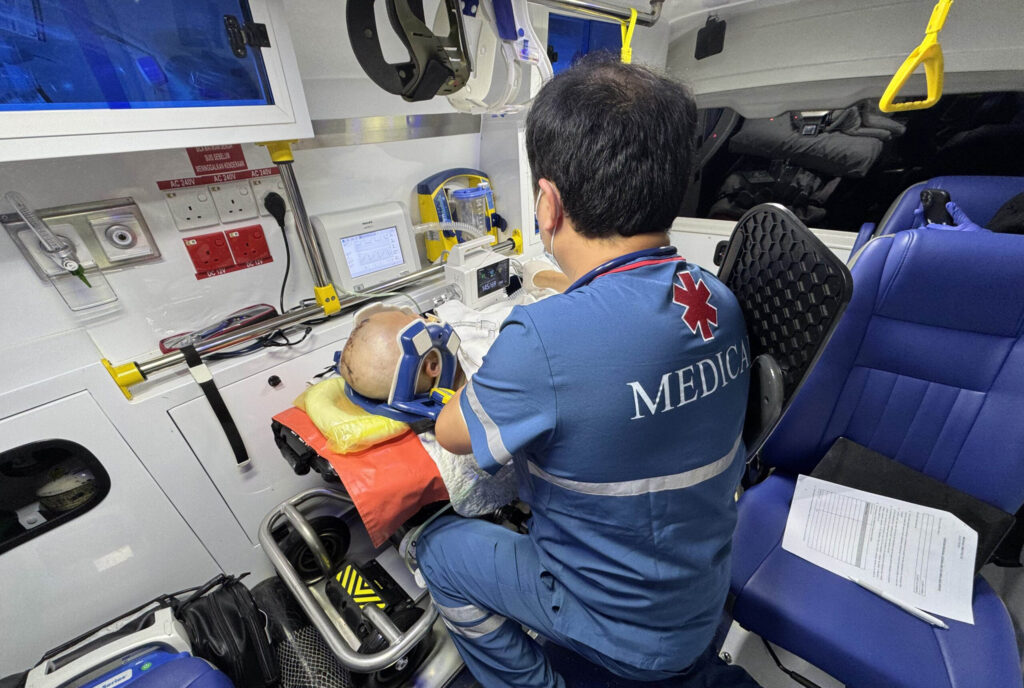 SAM medical professional caring for a patient during transport